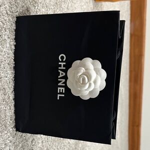 CHANEL Black Gift Bag with White Flower Accent